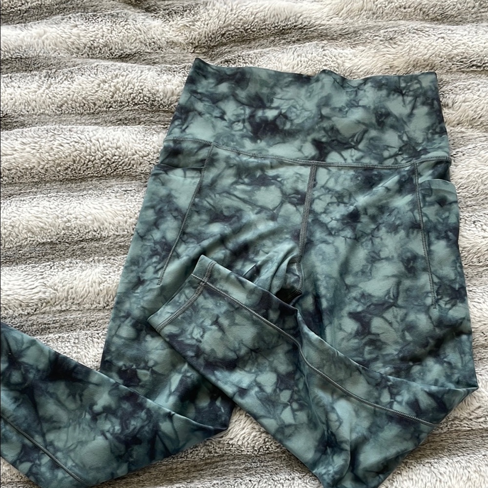 Athleta Green and Black High-Waisted Leggings- salutation stash pocket legging -